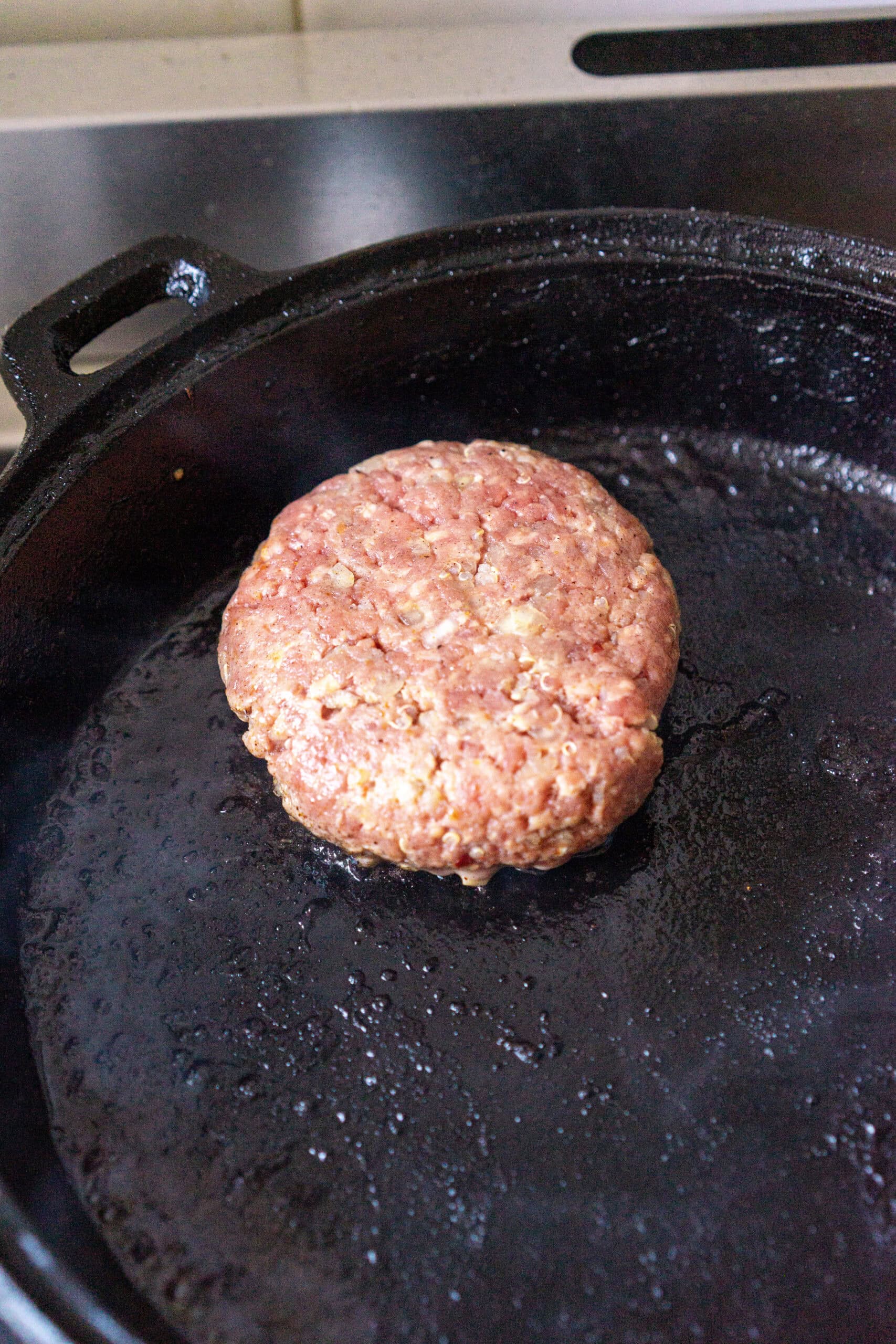 uncooked burger patty